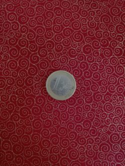 Spirale doree sur fond rouge 5602